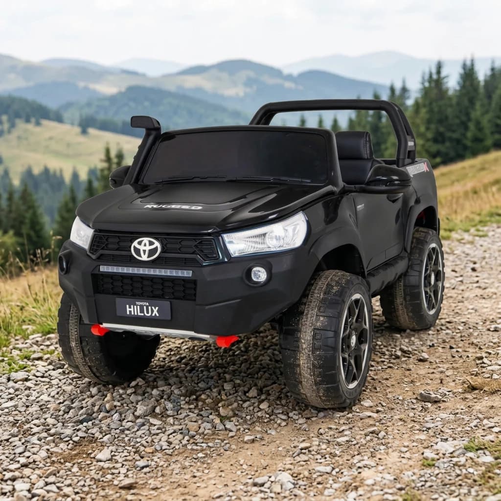 Лицензиран Акумулаторен Джип Toyota Hilux Rugged X, 180W, 4x4, 12V/14Ah, EVA гуми, двуместен, Черен – на планински черен път
